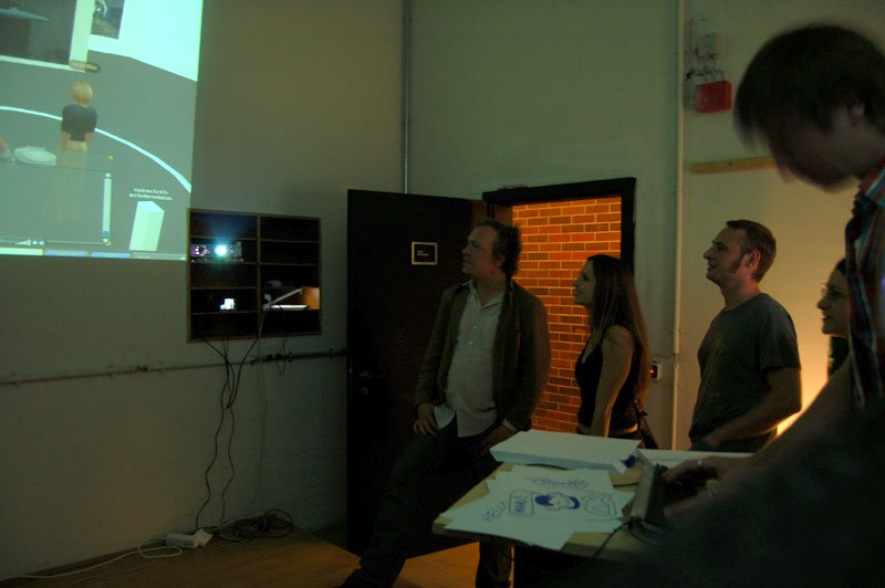 Visitors at the control table with the streaming setup