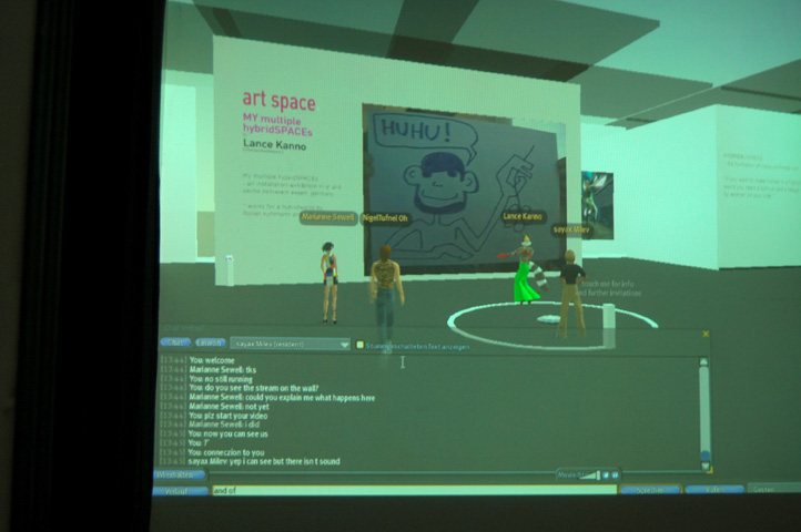The Second Life projection showing the exhibition title and wall texts