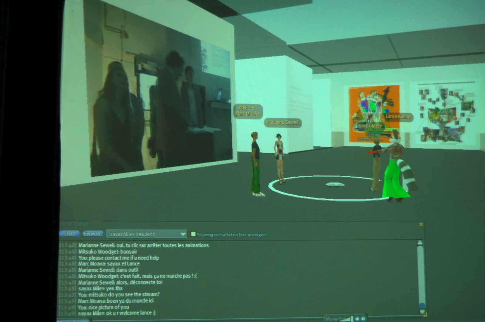 Wide view of the Second Life projection and a visitor