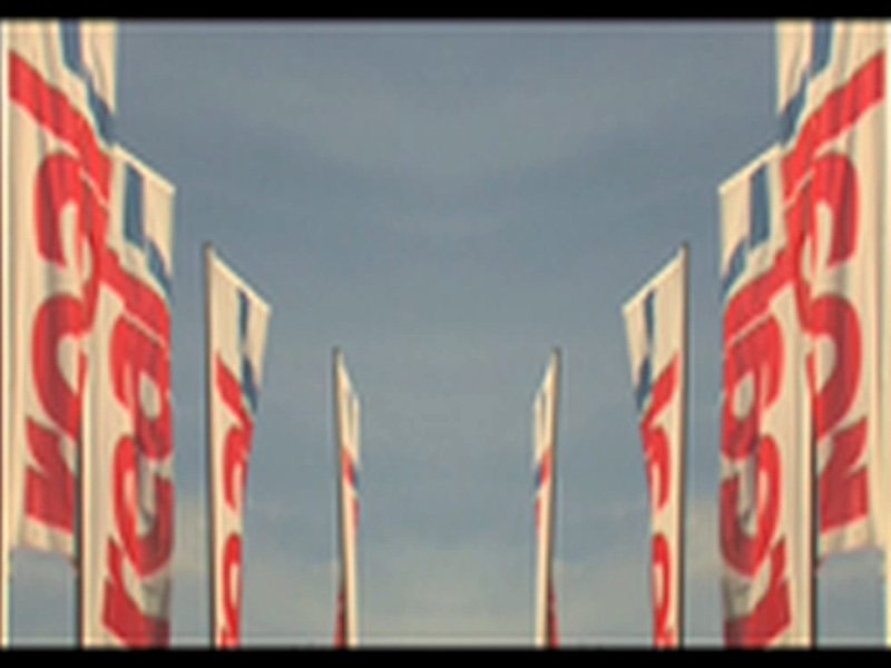 A close view of the red banner motifs between the panels